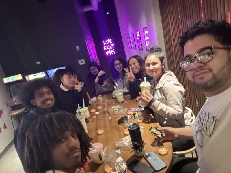 Inspire Core team enjoying drinks together at a late-night hangout