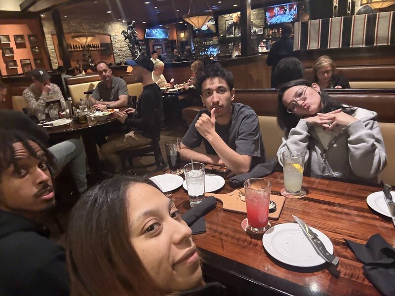 Inspire Core team sharing a meal together at a restaurant