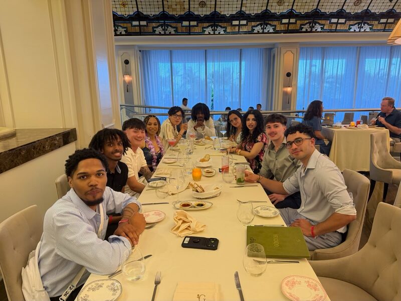 Inspire Core team at a long dinner table during the R and R 2026 trip