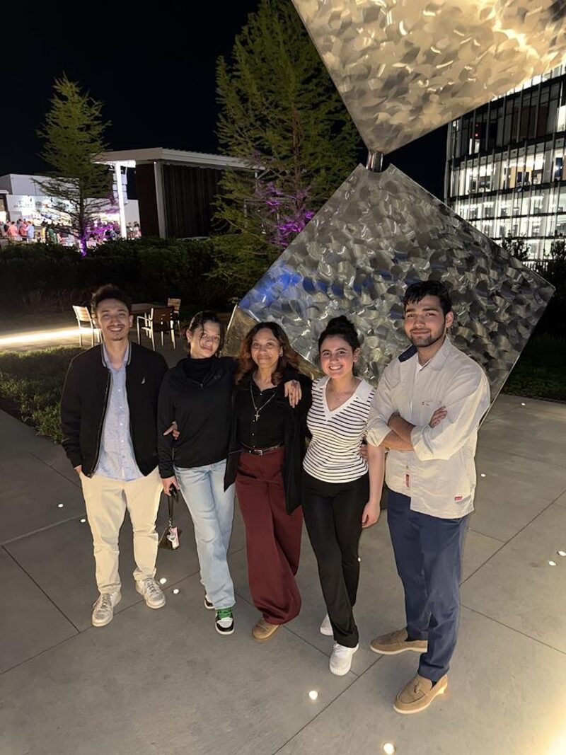 Inspire Core team posing together outdoors during an evening outing